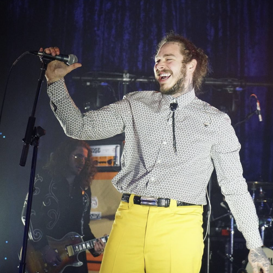 Post Malone performing on stage.