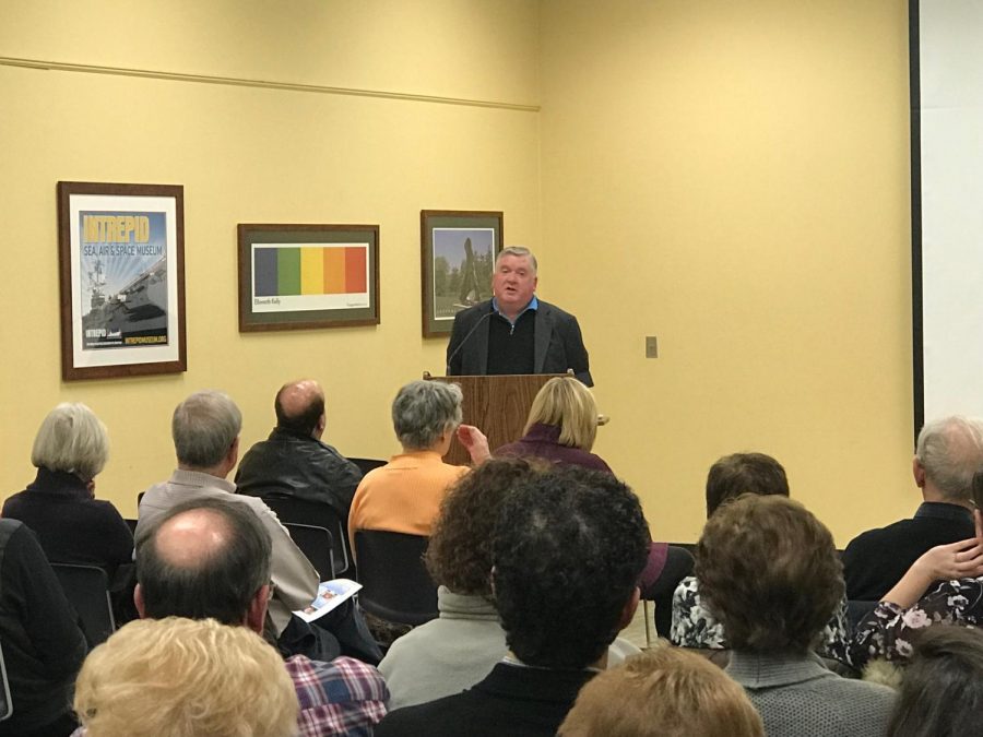Reporter Joe Nolan speaks to the community at the Westfield Memorial Library as a part of the Hale Speaker Series.