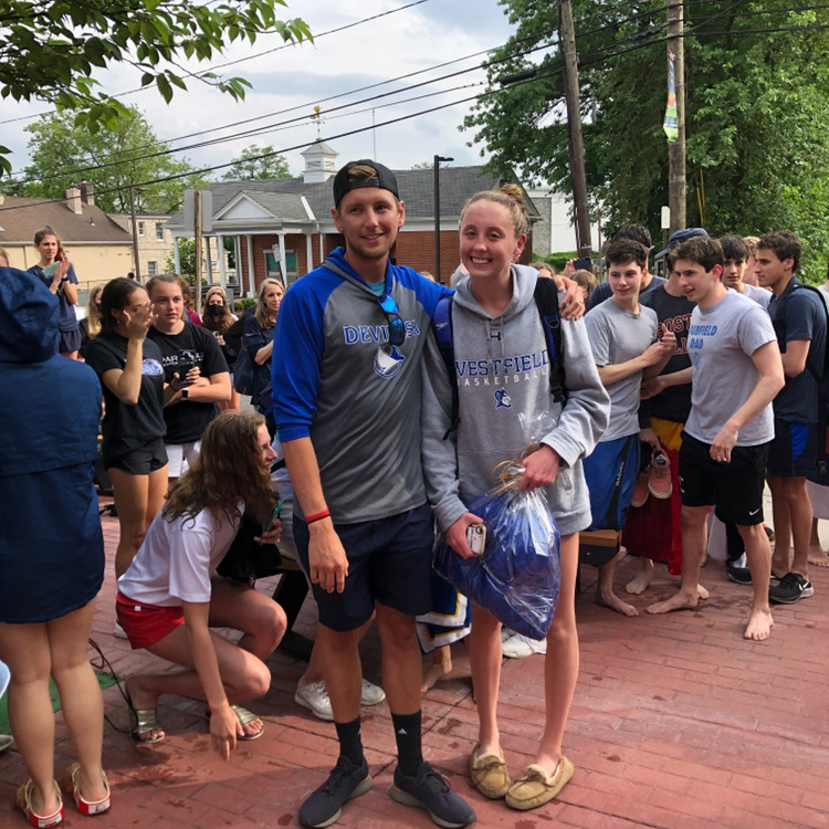 Clare Logan with Chris Cipolla, YMCA 
Devilfish coach, at her send-off last week
