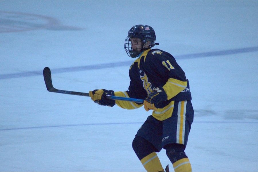 Mancheno playing hockey for his former club team, the North Jersey Avalanche