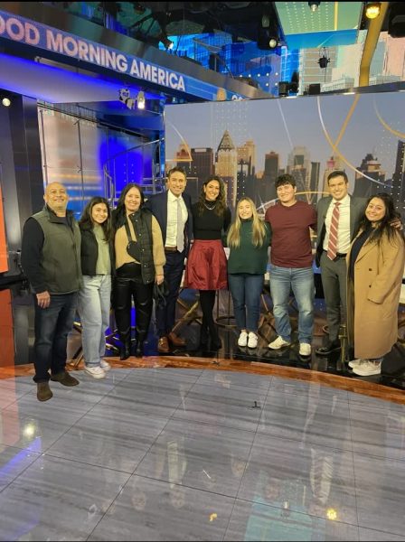 Josh and Julia Sackett on the set
of GMA with family and hosts