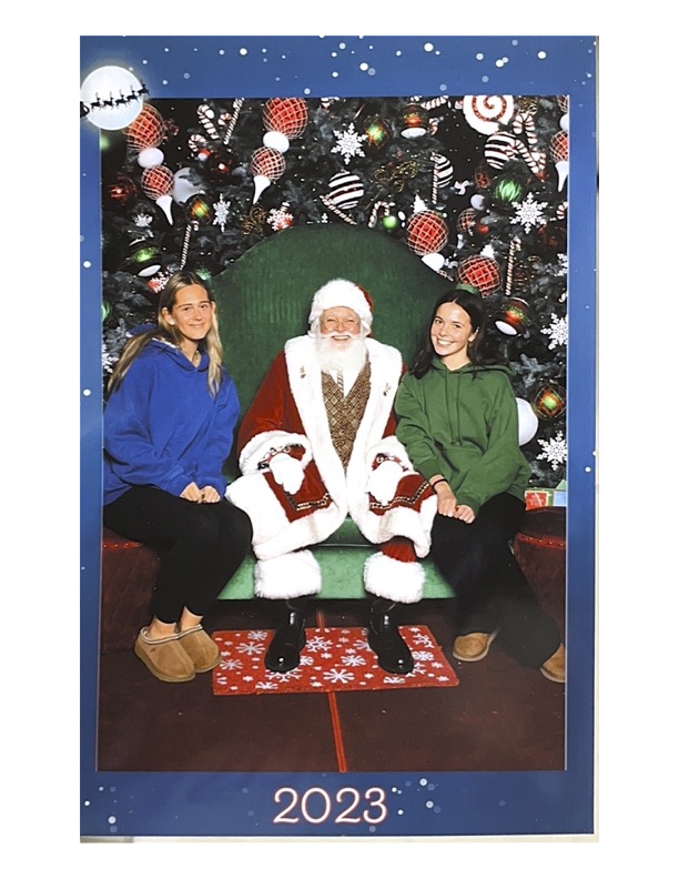 Julia Murphy and Adrian Fleming picture with Santa at the Menlo Park Mall