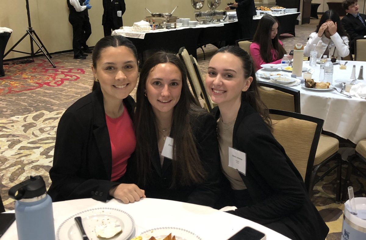 WHS juniors (from left to right) Zoe Urbano, Emily Kapuscinski and Olivia Lawrence at the YAG conference
