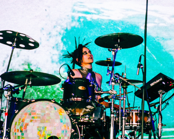 Lucy Ritter performing on the drums