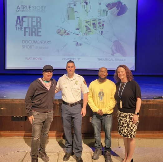 Shawn Simmons and Alvaro Llanos with Westfield firefighter and Principal Mary Asfendis