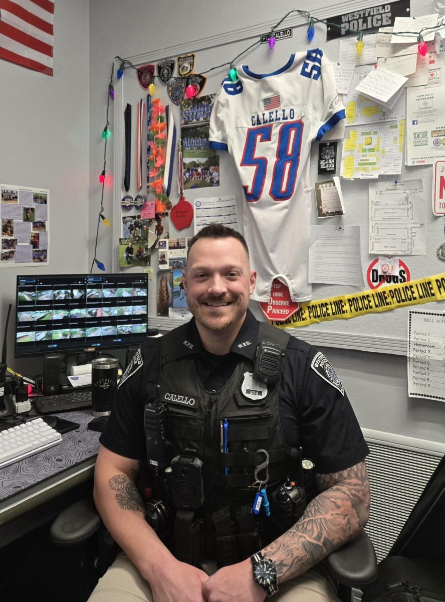 Officer Nick Calello sitting in his office
