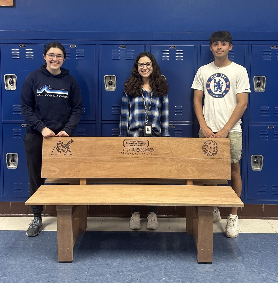 Brandon Genlot's memorial bench with Habitat for Humanity members Emma Blaustein, Gina Reynolds and Neil Shastri as photographed from left to right.