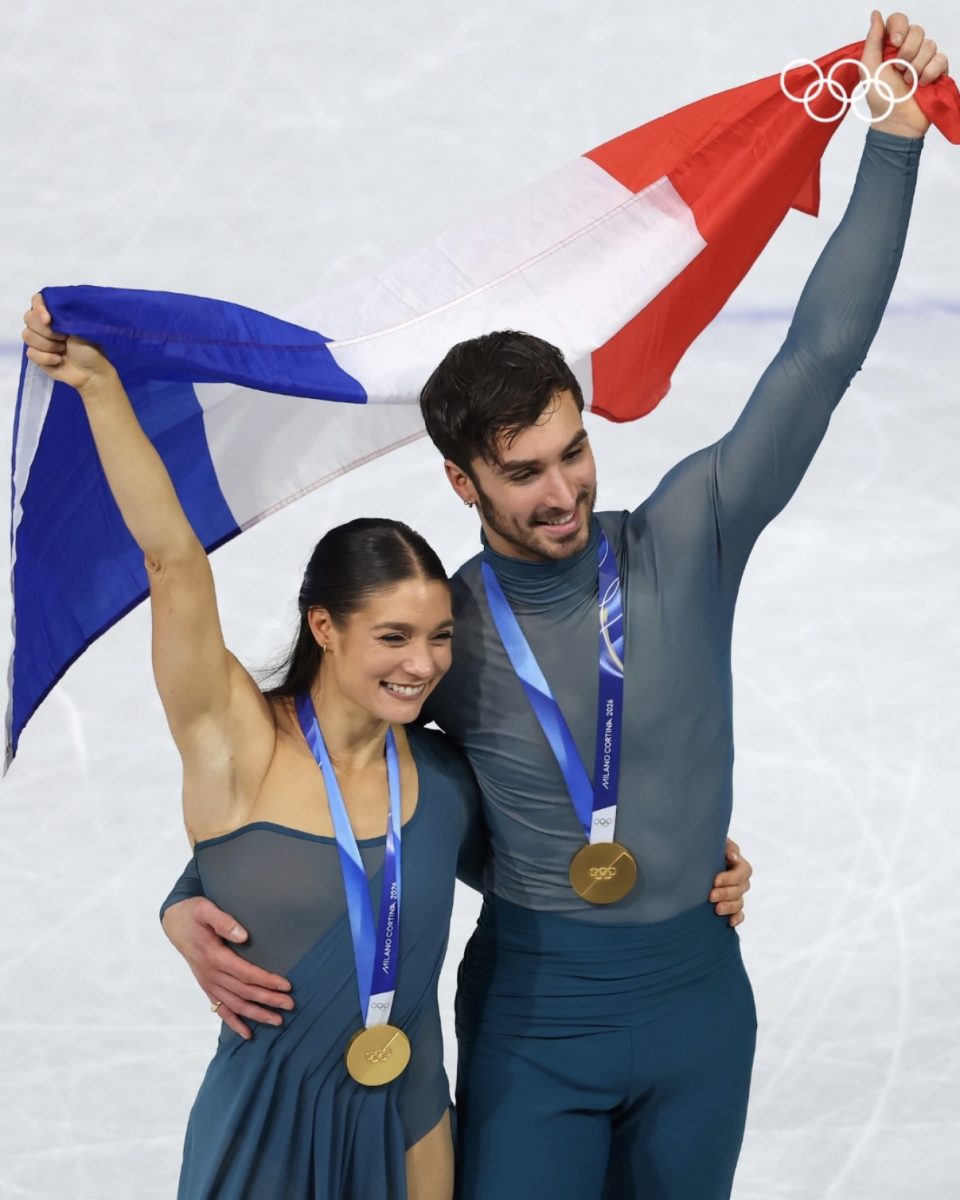 French ice dancing pair Laurence Fournier Beaudry and Guillaume 
Cizeron with their gold medals
